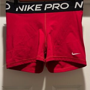 Nike Pro Dri-FIT Red Shorts with Black Waistband